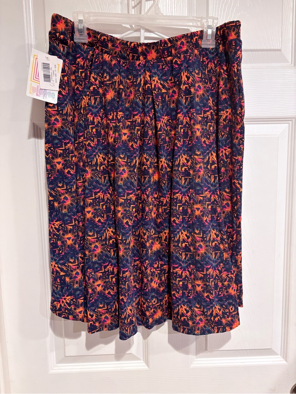 LuLaRoe Navy Skirt with Pink & Orange Burst Print